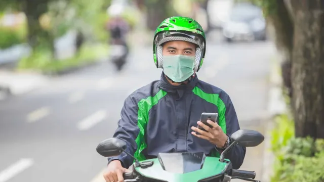 Polemik Regulasi Ojek Online dan Konvensional